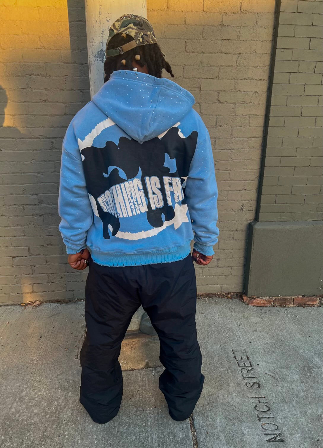 Blue “Nothing’s Free” Zip up